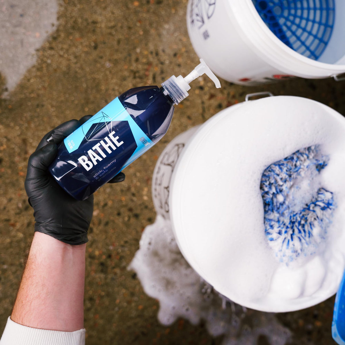 Gyeon Bathe used on clean car in driveway preserving gloss and water beading