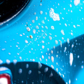 Gyeon before and after bug removal on hood benefit: restores clean glossy paint