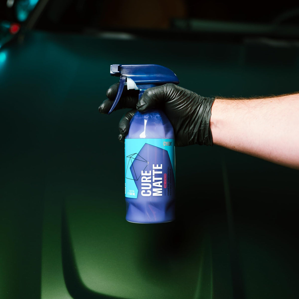 Gyeon being wiped with microfiber for streak-free, non-glossy result