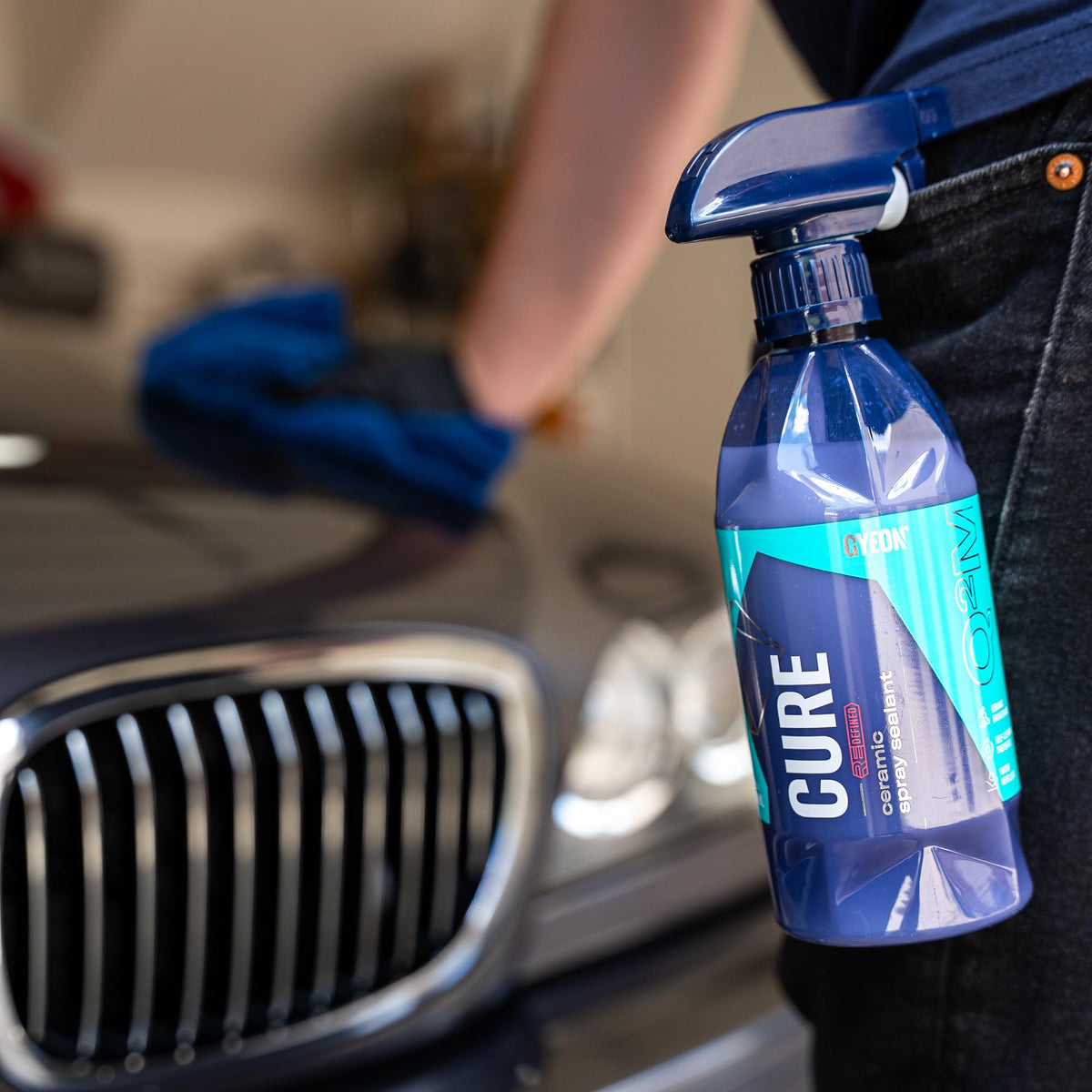 Water beading on treated paint by Gyeon Cure showing strong hydrophobic protection