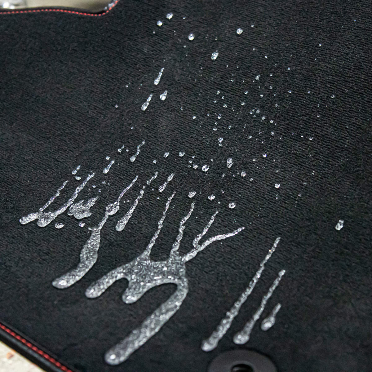 Gyeon being applied to convertible top providing UV and stain defense