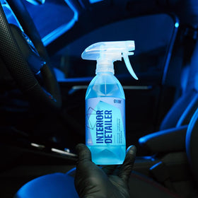 Gyeon product in a clean cabin lifestyle scene conveying quick freshness