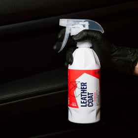 Gyeon Leather Shield EVO small bottle next to coin for size and convenience