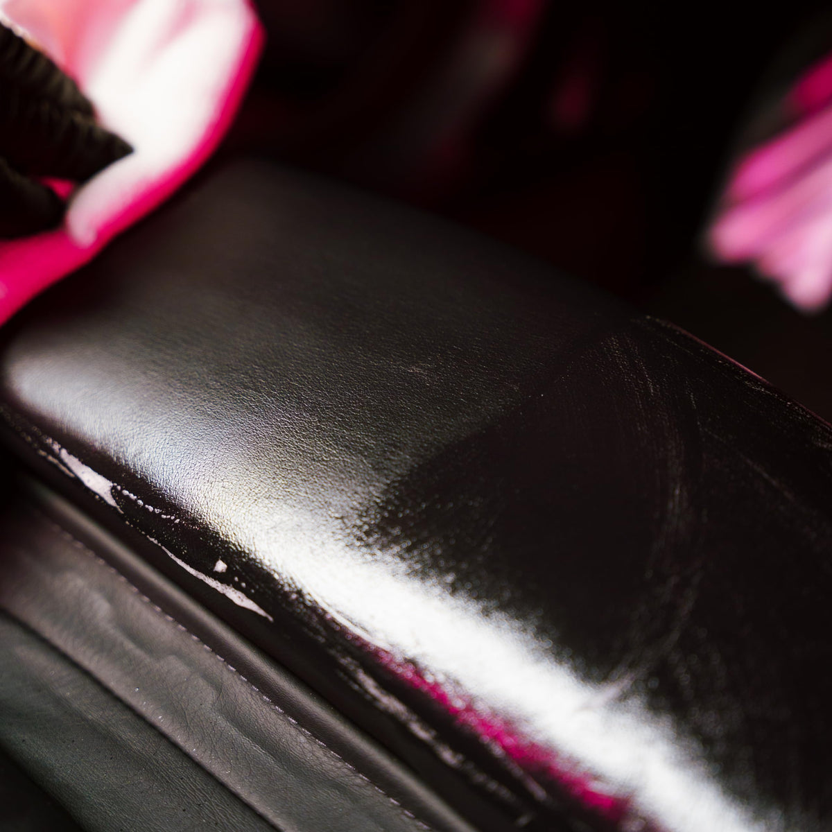 Gyeon before and after leather seat comparison showing restored clean benefit