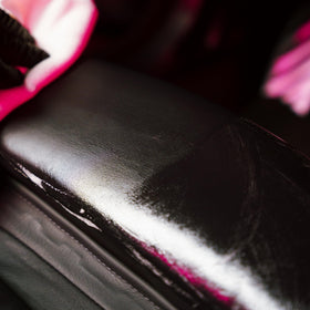 Gyeon before and after leather seat comparison showing restored clean benefit