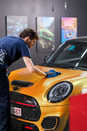 Side profile of a matte-wrapped car treated with GYEON showing consistent look benefit