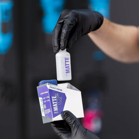 GYEON 50ml bottle next to ruler showing compact size and dosing convenience benefit