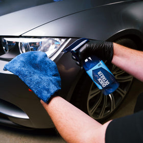 Gyeon detailer spritzed on show car illustrating photo-ready finish benefit