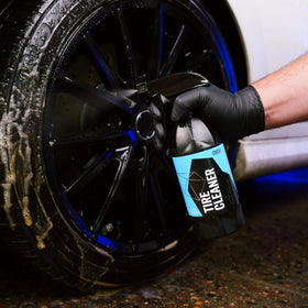 Gyeon brush agitation on tire demonstrating residue removal efficiency