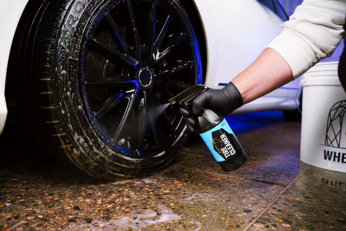 Gyeon cleaner sprayed near ceramic-coated wheel showing coating-safe use