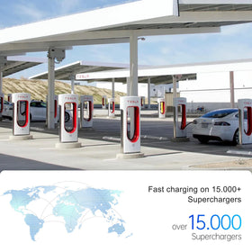 H HhaadenEV adapter plugged into a Tesla V3 Supercharger charging a CCS1 vehicle on road trip