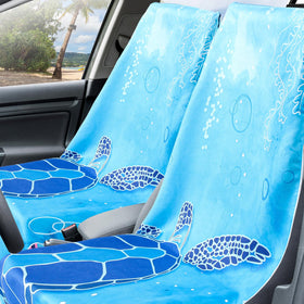 Hahafelt towel on beach drying swimmer and protecting car later
