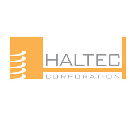 Technician using Haltec QS-500 during farm tire repair to reduce downtime