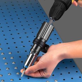 Haokixin lifestyle shot installing rivets on a door frame demonstrating easy on-site use