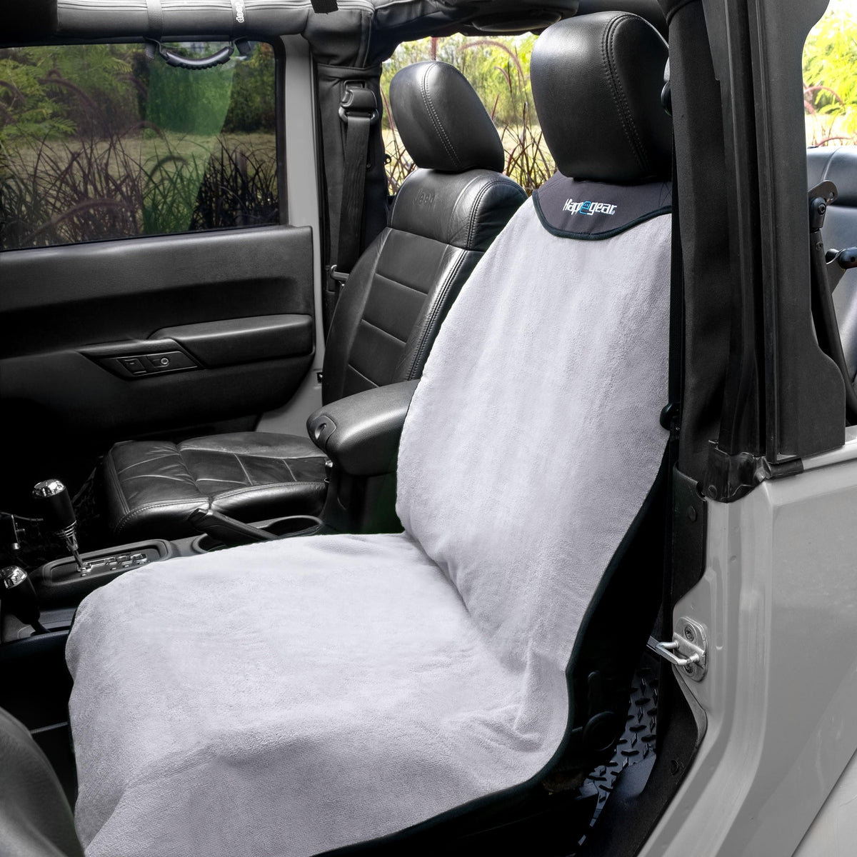 HAPPEGEAR on car seat for scale showing universal fit across bucket seats