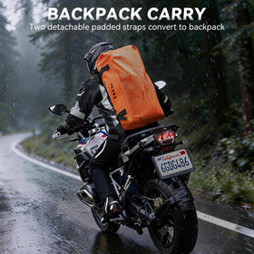 HEETA packed bag beside helmet to show 70L capacity and scale