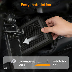 HENMI filter being placed into Tesla cabin compartment, demonstrates simple fitment