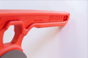 HitchGrip beside a hand to show scale and ergonomic handling benefit