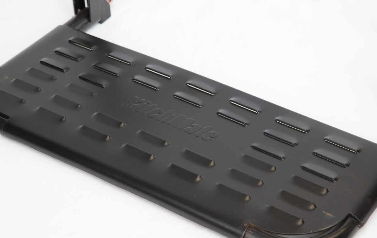 HitchMate TireStep used to reach roof rack, safer rooftop access
