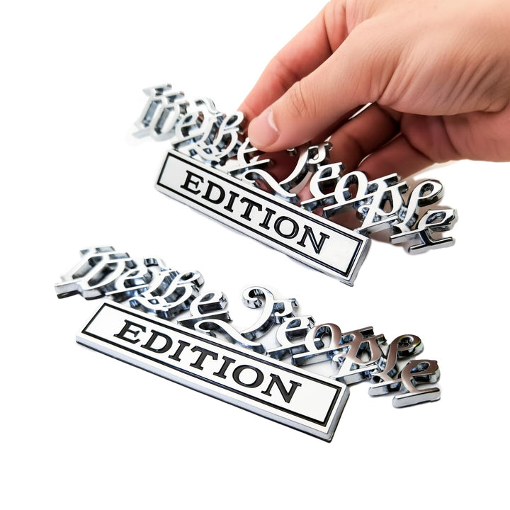 HJKK emblem front packaging showing two silver black badges and secure placement
