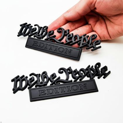 HJKK emblem front view showing matte-black patriotic badge and premium look