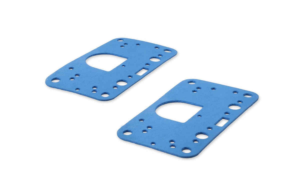 Holley gasket next to ruler showing scale for accurate sizing confirmation