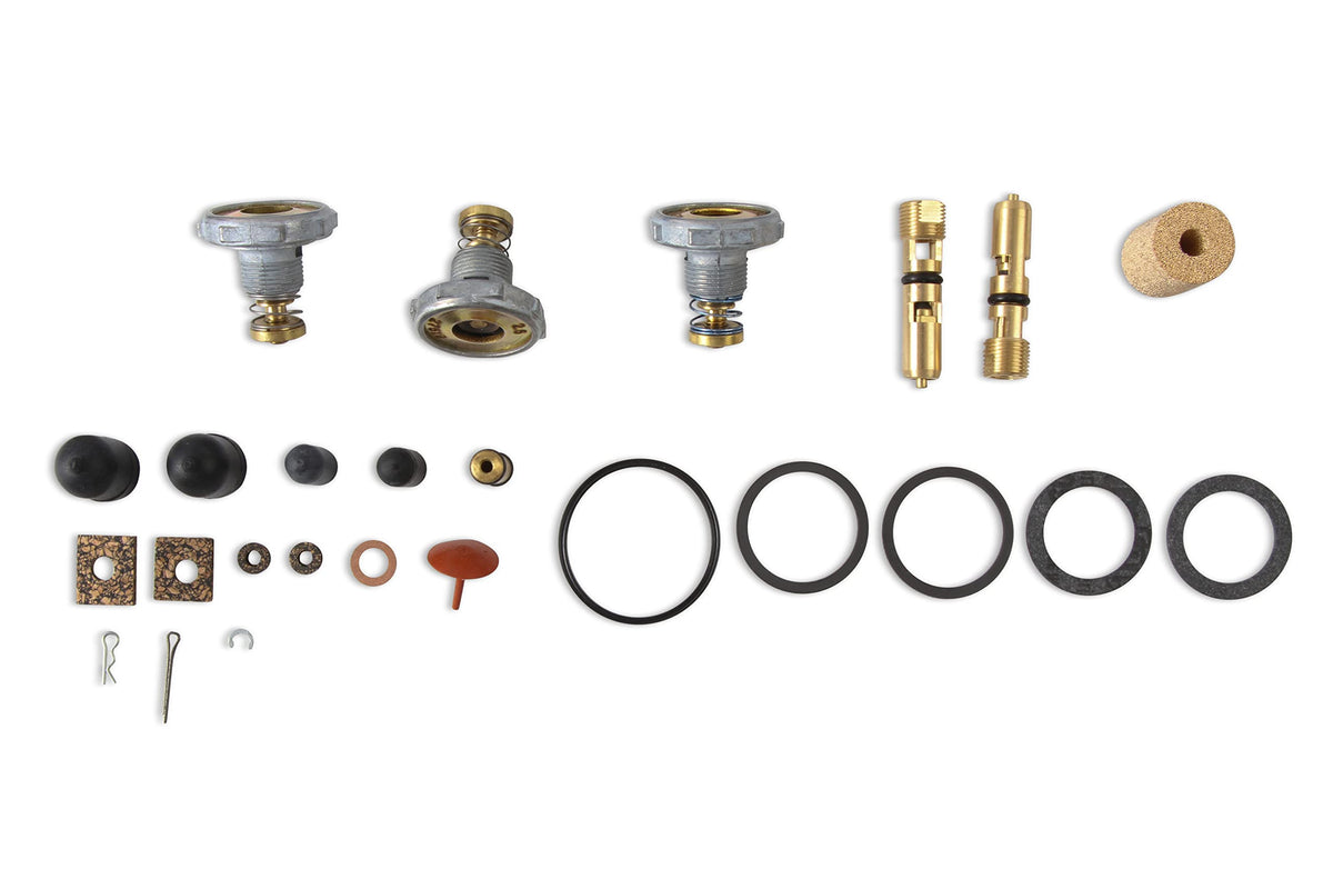Holley kit beside a ruler to show scale and included small parts for planning