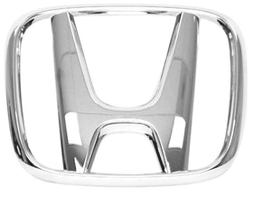 Honda emblem installed on vehicle grille demonstrating proper fit and restored appearance