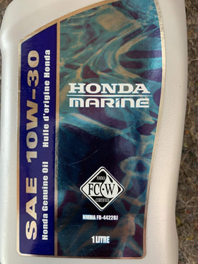 Honda marine oil on a boat deck during maintenance illustrating OEM protection benefit