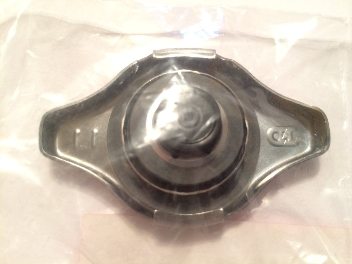 Honda radiator cap packaging and dimensions showing compact shipping convenience
