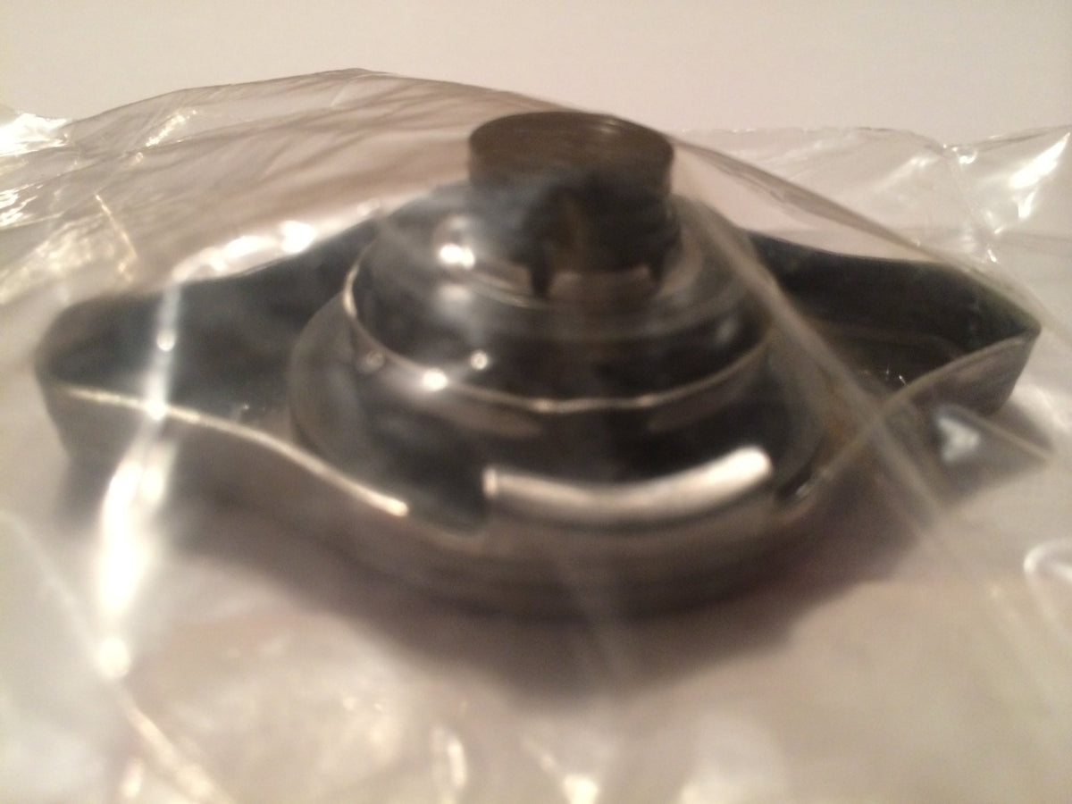Honda radiator cap scale comparison illustrating size for easy replacement