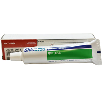 Honda silicone grease tube front view showing OEM label and compact size benefits