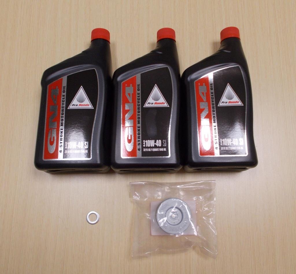 Honda TRX350 Rancher oil service kit front packaging showing OEM filter and seal, ensures correct fit