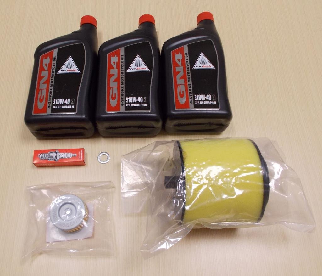 Honda TRX450 Foreman tune-up kit front packaging showing parts for faster maintenance