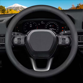 HONQIRAX front view on steering wheel showing sleek black finish and improved grip