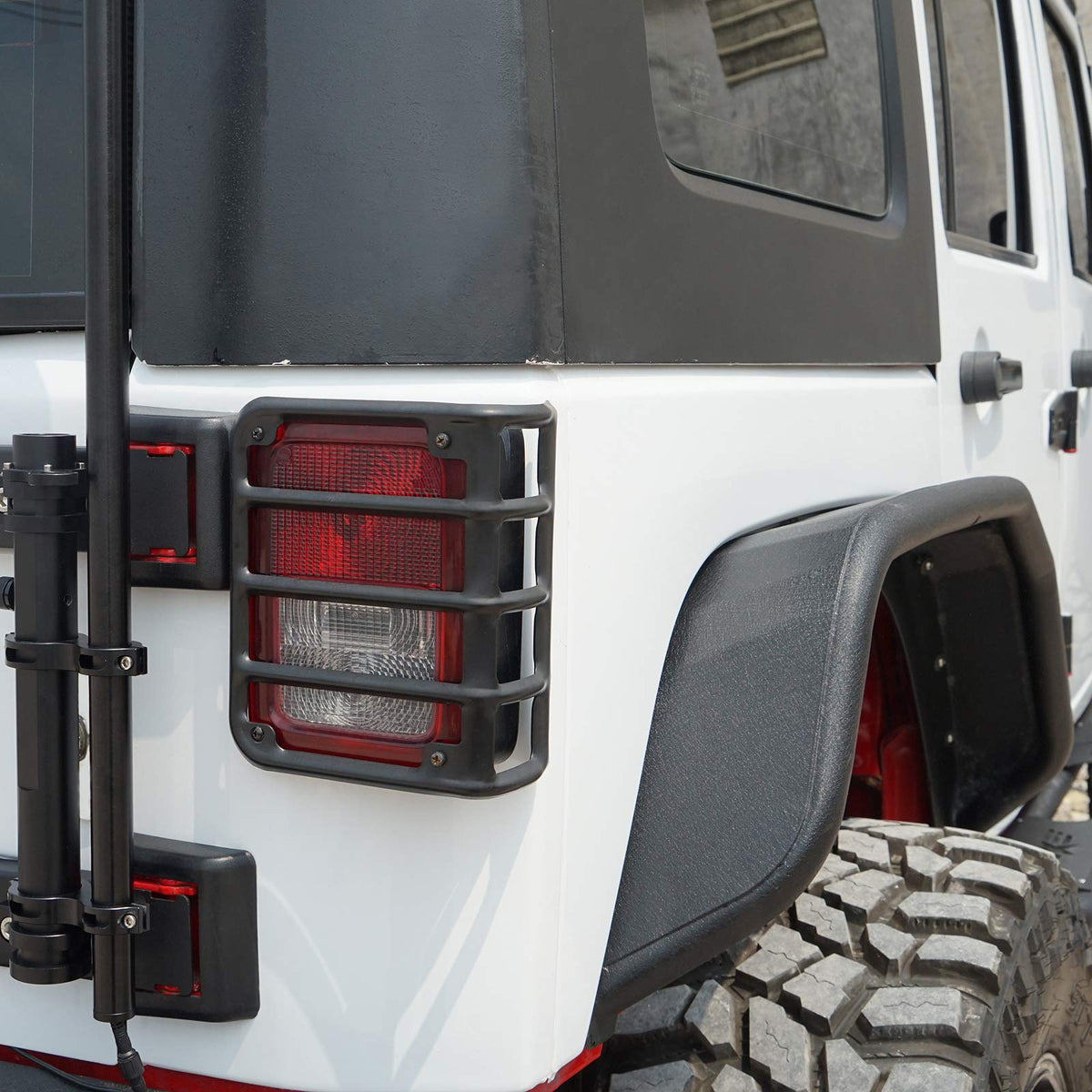 Hooke Road guard on Jeep in trail setting showing protection during off-road use