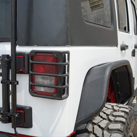 Hooke Road guard on Jeep in trail setting showing protection during off-road use