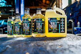 Hot Shot's Secret FR3 bottle on a workbench signaling shop-ready professional performance