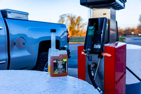 Hot Shot's Secret being poured into diesel tank to prevent gelling