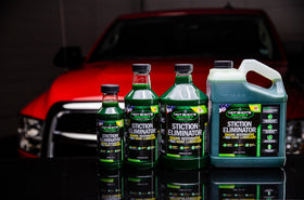 Hot Shot's Secret gallon beside oil filter for scale showing convenient shop-sized supply