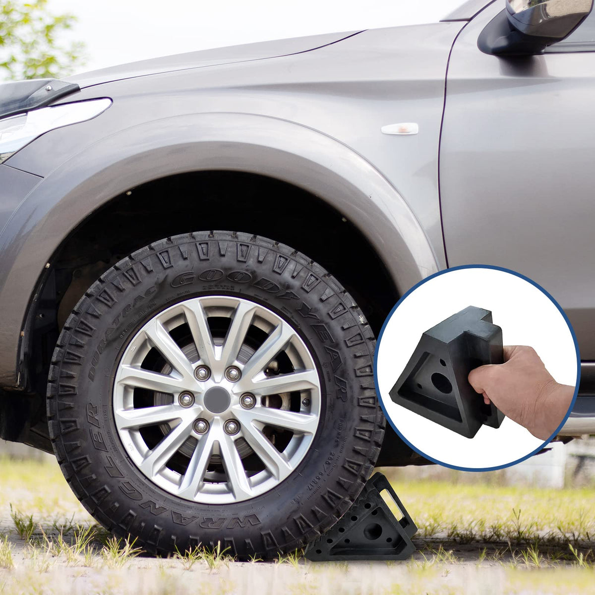 HOXWELL chock placed under RV tire demonstrating stability during parking benefit