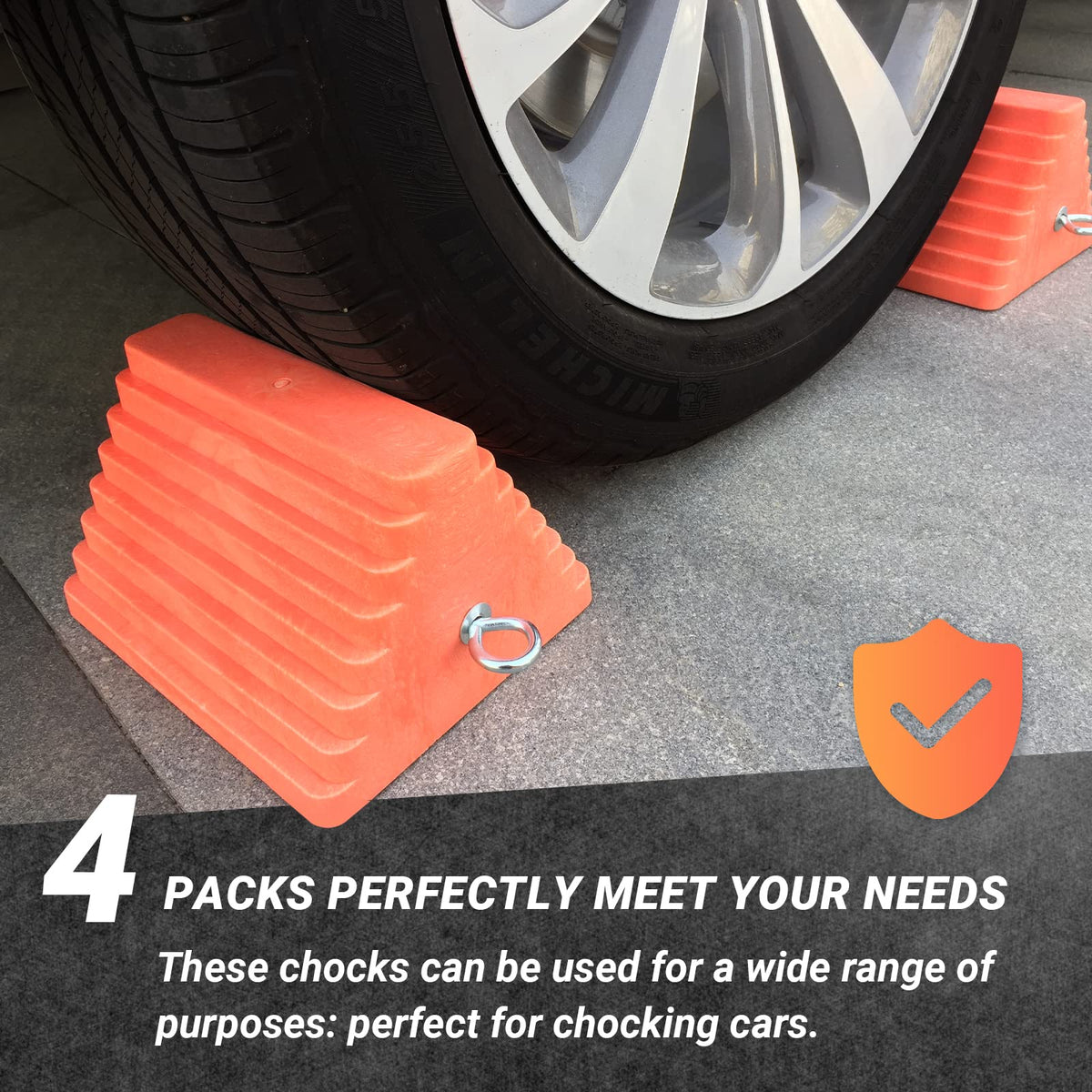 HOXWELL chock next to hand showing compact size and lightweight handling advantage