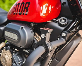 HQTS clamp installed on motorcycle handlebar showing no-drill mounting benefit