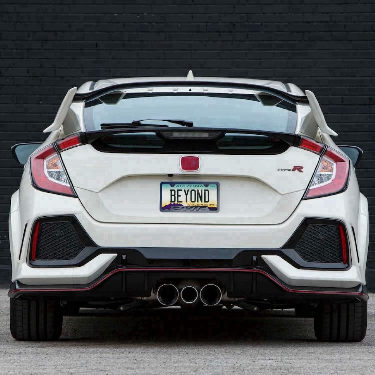 HUIANTS frame beside a ruler showing 12x6 size for correct license plate fit