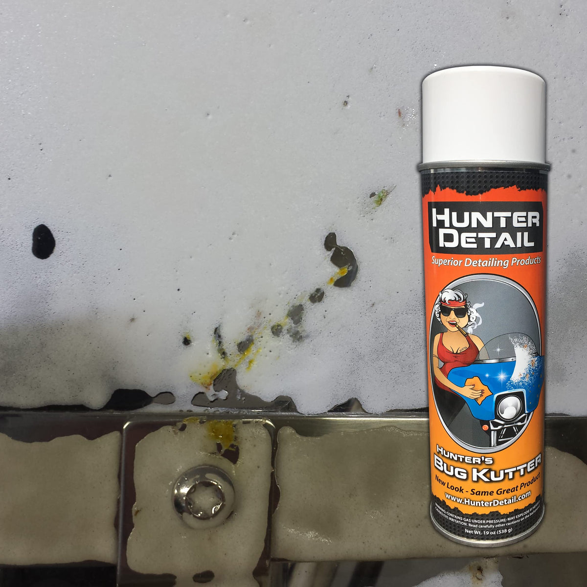 Hunter Detail can spraying onto windshield demonstrating bug removal for clearer visibility