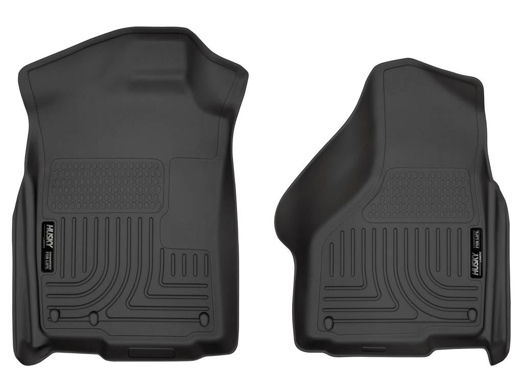 Husky Liners driver-side front liner showing precise fit and carpet protection