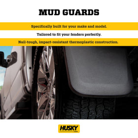 Husky Liners installed front mud guard on Ram 2500 showing factory fit