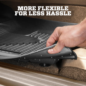 Husky Liners installed second-row wide view showing complete carpet protection