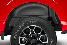 Husky Liners lifestyle shot of F-150 in driveway illustrating long-term protection and appearance