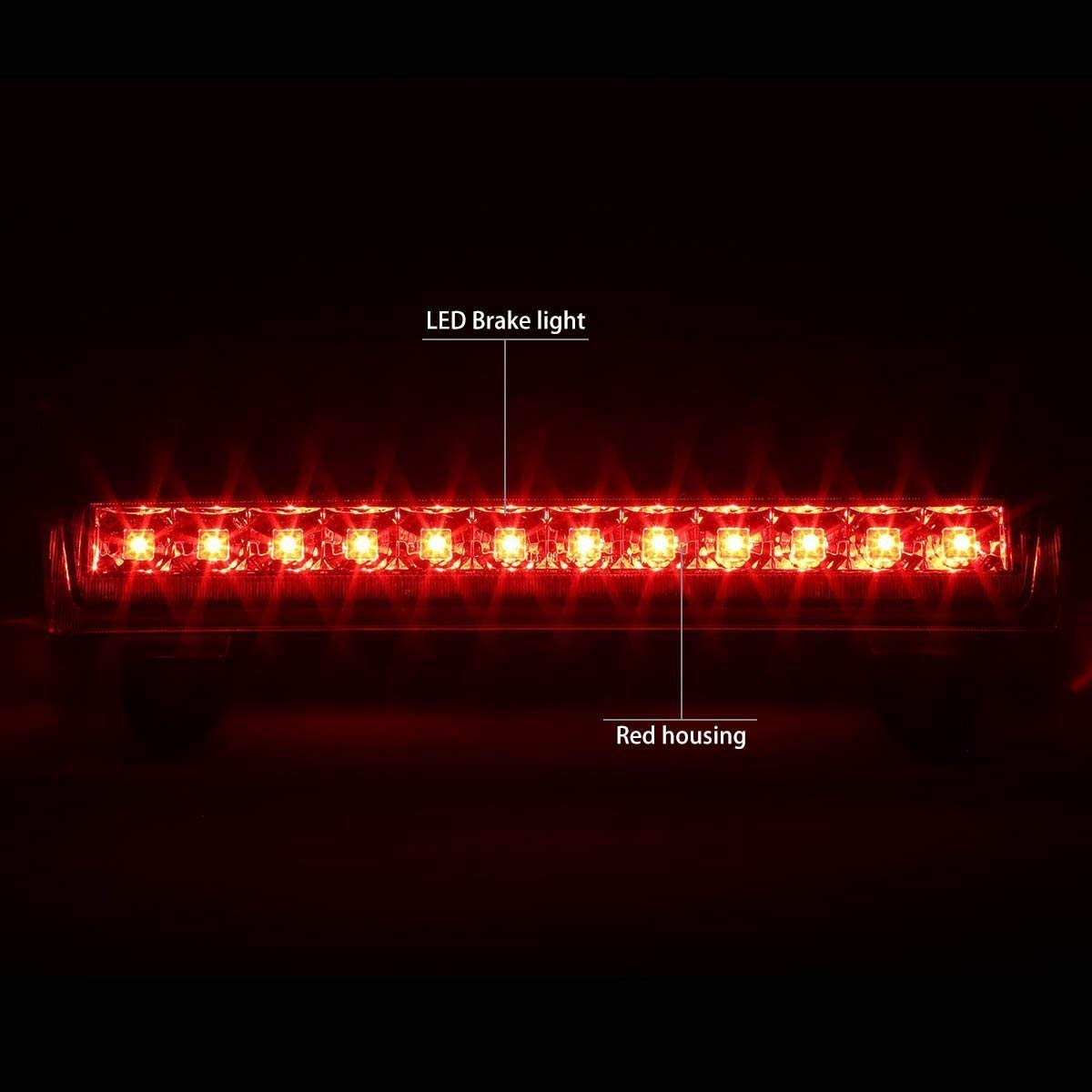 HUSUKU brake light with water splashes illustrating IP65 weather protection